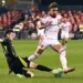 Columbus Crew's Sean Zawadzki, left, strips the ball from Toronto FC's Theo Corbeanu during second-half MLS soccer action in Toronto, Saturday, Aug. 16, 2025. (Jon Blacker/The Canadian Press via AP) (ASSOCIATED PRESS)